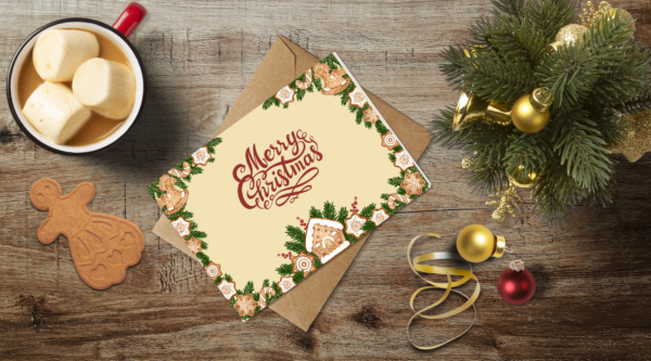 christmas themed holiday greeting card with a kraft envelope top view mockup template 655376afb738fabf2c1e9714@2x 1