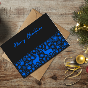 christmas themed holiday greeting card with a kraft envelope top view mockup template 655b37bba2064af79c46c4e9@2x
