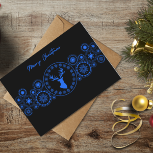 christmas themed holiday greeting card with a kraft envelope top view mockup template 655b3961a2064af79c46c591@2x