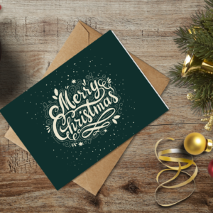 christmas themed holiday greeting card with a kraft envelope top view mockup template 655b3fa6a2064af79c46cec7@2x