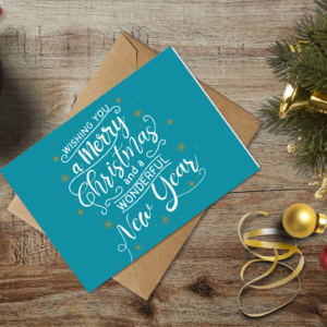 christmas themed holiday greeting card with a kraft envelope top view mockup template 655b4218a2064af79c46d25e@2x